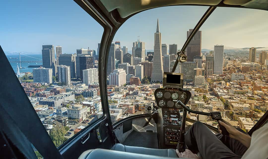Point of view from inside a helicopter as it approaches downtown San Francisco