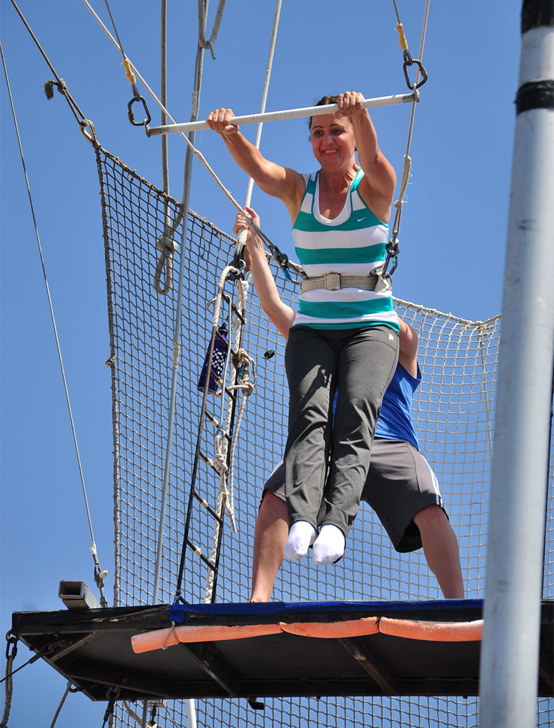 Tana performs an acrobatic stunt