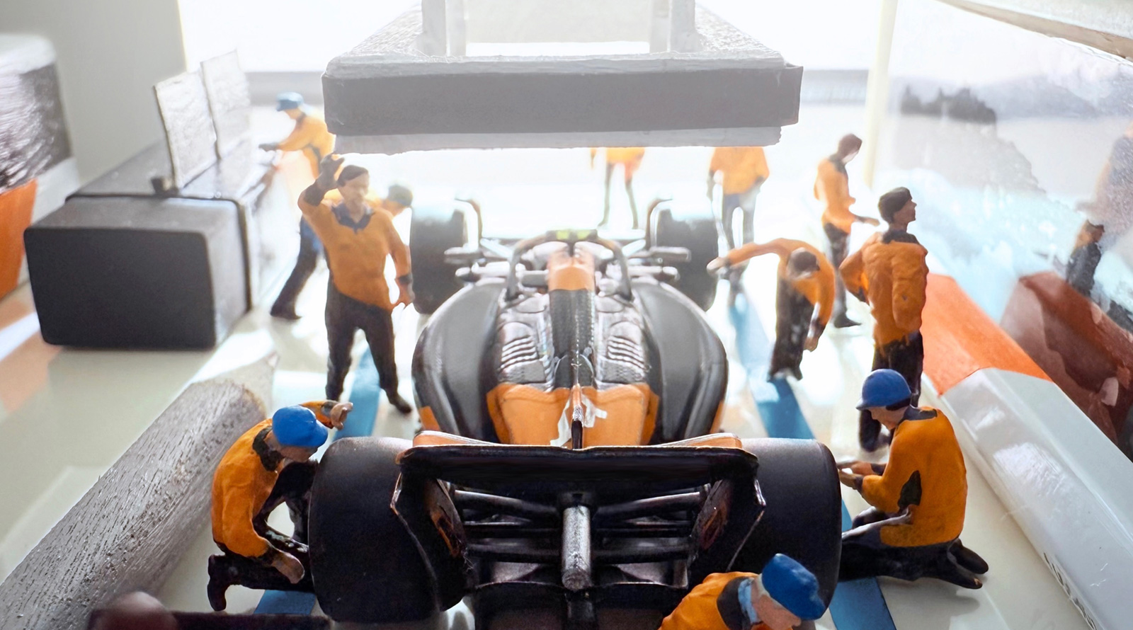 McLaren F1 car and engineers in McLaren garage