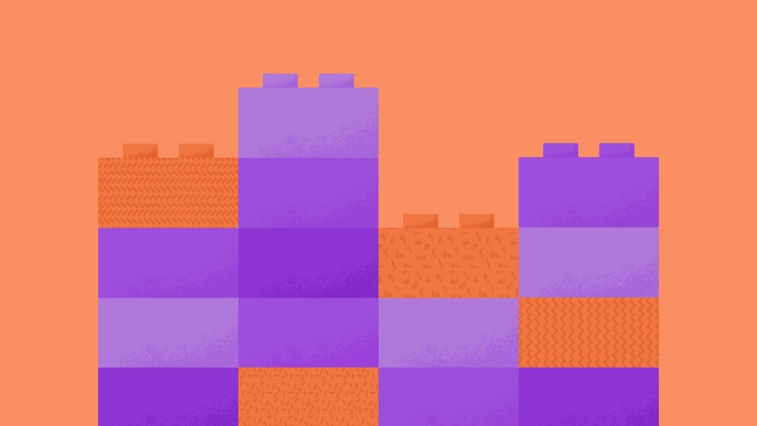 Purple and orange building block pieces stacked on top of each other